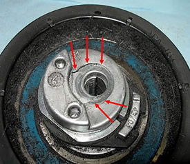 automatic tensioner: Broken central pin